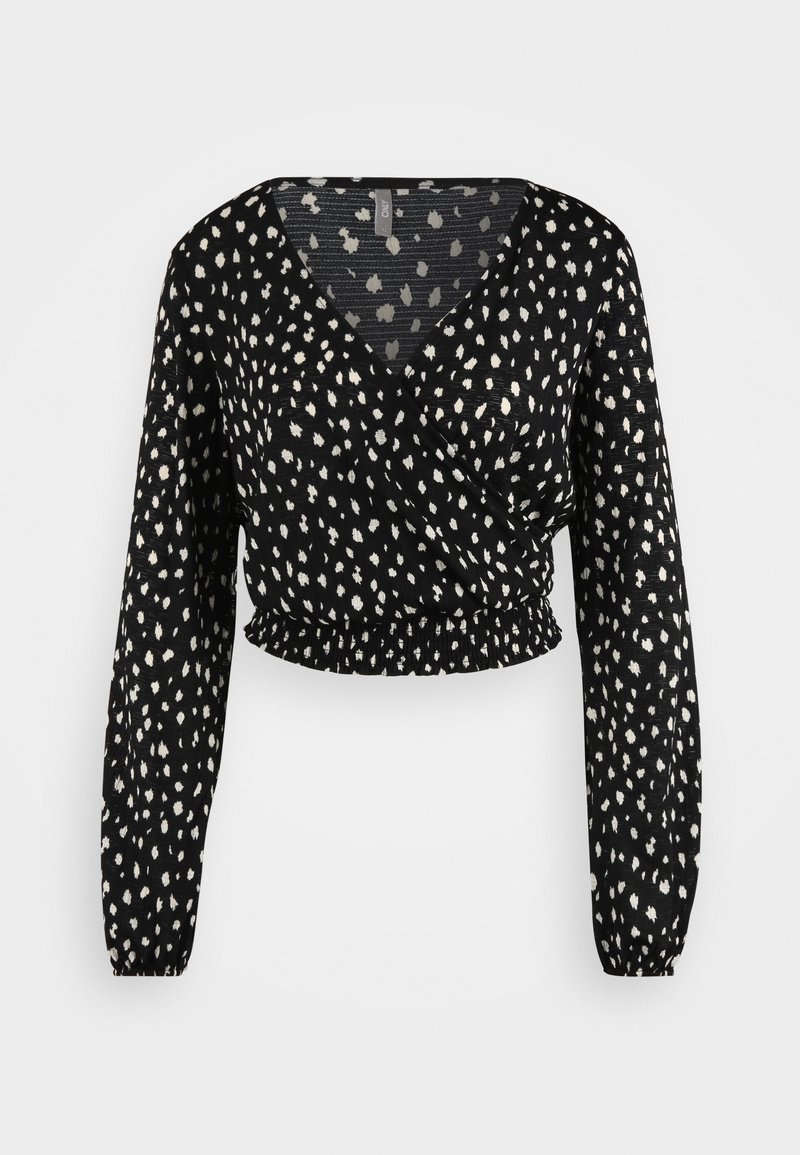 Black wrap top featuring a v-neckline, long sleeves, gathered hem, and a white speckled pattern on a textured fabric.