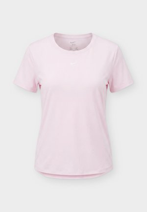 Hellrosa Nike Dri-FIT T-Shirt mit kurzen Ärmeln und Rundhalsausschnitt, mit kleinem weißem Nike Swoosh-Logo mittig auf der Brust.
