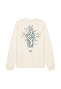 Εκρού φούτερ με γραφικό μπλε βάζο και κείμενο στην πλάτη. Λεία υφή με ριμπ μανσέτες και τελείωμα. Κανονική εφαρμογή.