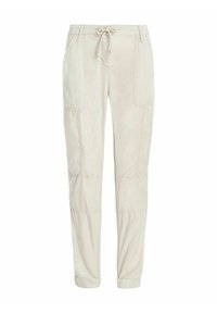 Pantaloni jogger in cotone beige con vita regolabile con coulisse, tasche laterali a toppa e orli cuffati. Dettagli di cucitura su tutto il capo.