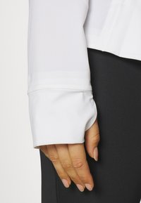 lululemon MIST OVER WINDBREAKER - Giacca a vento - white