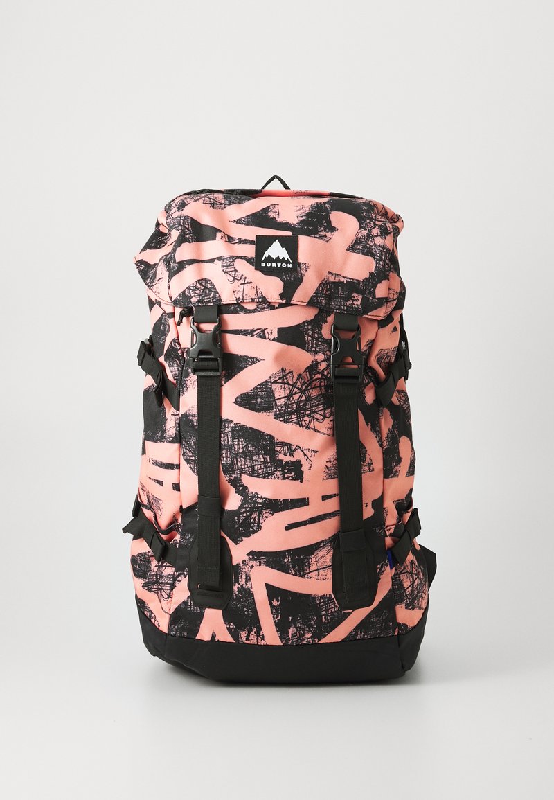 Black and coral backpack with abstract patterns, adjustable black straps, and a roll-top closure. Features a brand logo in the center.