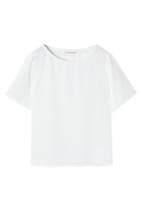 Top blanco de manga corta con escote redondeado, fabricado en una tela suave. Presenta un corte holgado y un diseño minimalista.