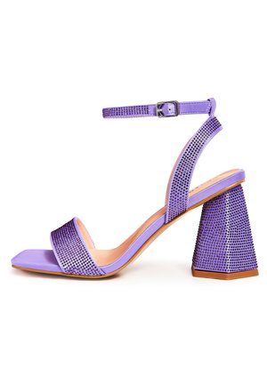 Purple high-heeled sandals with a textured square toe, embellished with rhinestones, and featuring a buckle ankle strap and geometric heel.