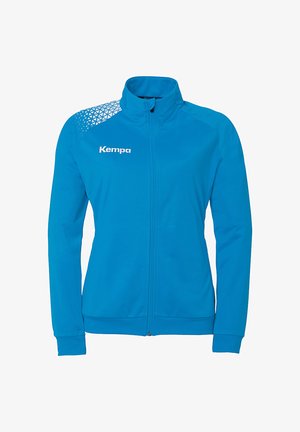 Blå zip-up sportsjakke lavet af glat stof, med en høj hals og et geometrisk mønster på den ene skulder. Logo på forsiden.