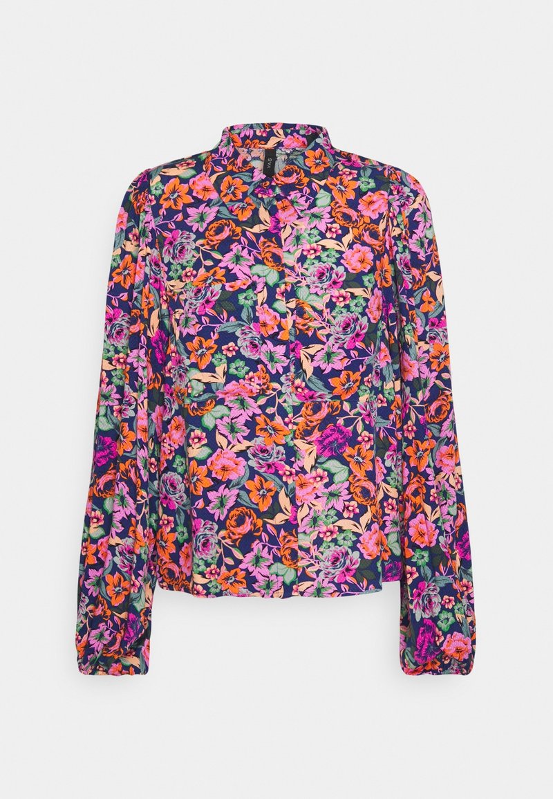 Blouse à manches longues avec boutons, ornée d'un motif floral multicolore vif aux teintes de rose, orange, vert et violet sur un fond foncé.
