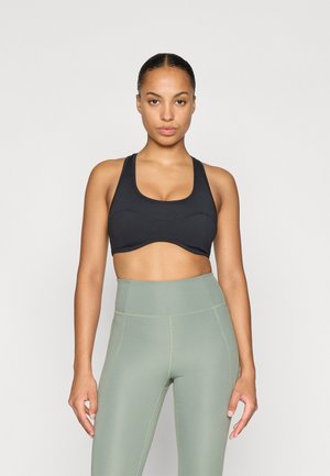 CONNIE CURVED BRA - Sports-BH'er med medium støtte - black