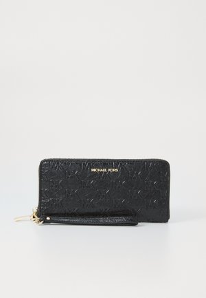 Black leather wallet with embossed MK logo pattern, gold hardware, zipper closure, and detachable wrist strap. Flat rectangular shape.