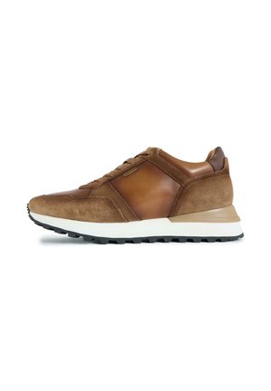 Brown leather and suede sneaker with white sole and black tread, low-top design, and lace-up closure shown in side profile.