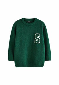 Grön stickad tröja med en texturerad yta, försedd med en vit bokstav "S"-patch på vänster bröst. Rund halsringning och långa ärmar.