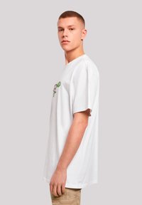 White cotton t-shirt featuring a colorful graphic design on the front. Relaxed fit, short sleeves, and a round neckline.