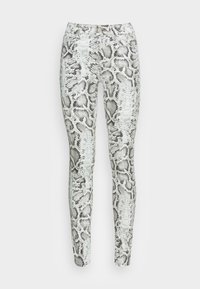 Leggings com um padrão de pele de cobra em preto e cinza, feitos de material elástico, com um design ajustado e uma cintura alta.