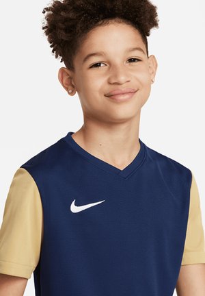 Nike-Sporttrikot mit einem dunkelblauen Körper und hellbeigen Ärmeln. V-Ausschnitt-Design und auffälligem weißem Logo auf der Brust.