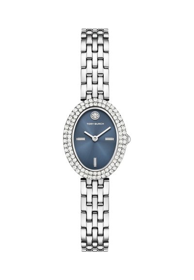 Montre bracelet argentée avec cadran ovale bleu, logo Tory Burch et double rangée de cristaux entourant la lunette.