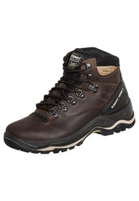 Braune Lederwanderstiefel mit Metallaugen, schwarzen Schnürsenkeln, gepolstertem Kragen und einer robusten Gummisohle mit Vibram-Branding.