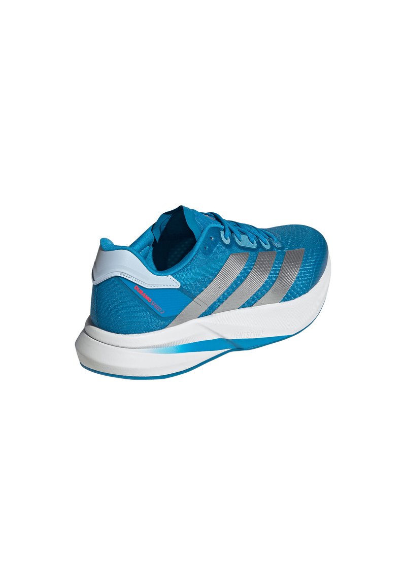 Blue athletic shoe with a textured upper, silver stripes, and white sole. Features a cushioning midsole and padded collar for comfort.