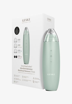 Éliminateur de points noirs microdermabrasion 7-en-1 GESKE avec plusieurs embouts, niveaux d'aspiration et technologie de soin de la peau guidée par application en vert menthe.