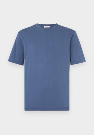 Kortærmet crewneck-t-shirt i ensfarvet blå bomuld, har en lige kant og blød tekstur, velegnet til afslappet brug.