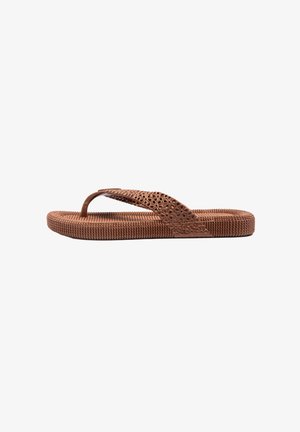 Brown rubber flip-flop featuring a textured sole, decorative cut-outs on the strap, and a seamless design for lightweight wear.