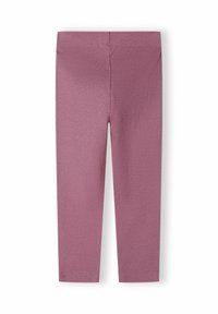 Mjuka ribbade leggingar i dämpad rosa med elastisk midja och rak benkonstruktion, visade liggande på en vit bakgrund.