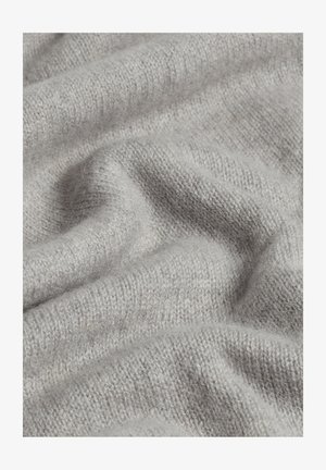 Light gray knitted fabric with a soft texture, displaying a loose, draped appearance and subtle variations in color throughout.