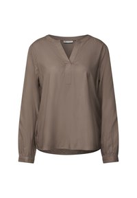 Blouse marron à manches longues avec un décolleté en V, présentant une coupe ample, une texture douce et des accents froncés au niveau des poignets.