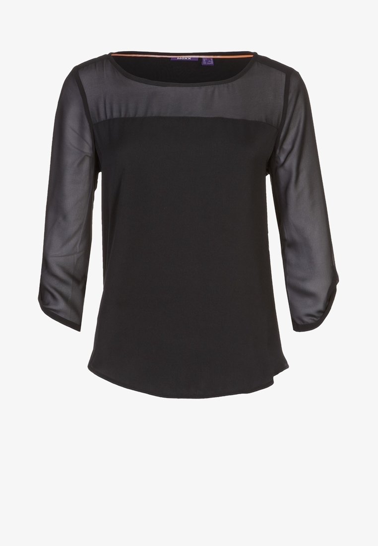 Black top with three-quarter sleeve. Features a matte body and sheer panel across the chest. Rounded hem with a smooth texture.