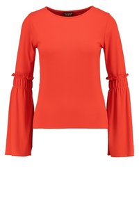 Röd, randig långärmad topp med rund halsringning och rynkade detaljer vid ärmsluten, vilket skapar en utsvängd ärmeffekt.
