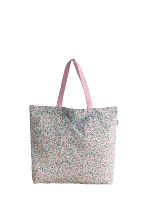 Reusable tote bag with small pink and green floral pattern and solid pink handles against white background.