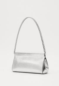 Metallic silver handbag with a smooth texture and a sleek design. Features a chain handle and a structured shape.