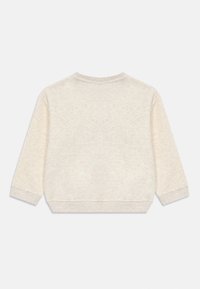 Felpa a maniche lunghe color crema con polsini e orlo a costine, mostrata da dietro su uno sfondo bianco.