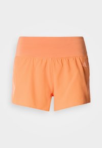 Shorts de sport orange avec une ceinture élastique lisse. Coupe ample avec un tissu léger. Présentent une texture légèrement brillante sur les côtés.