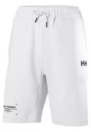 Witte katoenen shorts met een trekkoord in de taille, zijzakken en een zwart gedrukt logo op de linkerbovenbeen en achterkant. Gladde textuur.