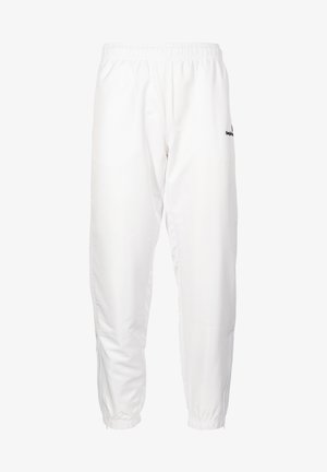 Witte sportbroek met een elastische tailleband, taps toelopende enkels en een zachte textuur. Bevat een klein logo aan de linkerkant.