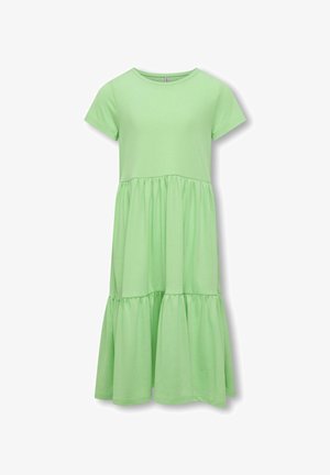 Abito verde chiaro a maniche corte con scollatura rotonda. Presenta una gonna a strati con dettagli arricciati. Tessuto morbido e liscio.
