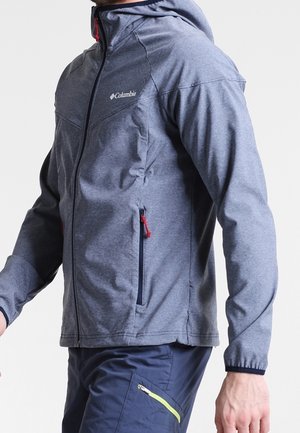 Veste synthétique bleue avec capuche, dotée d'une fermeture éclair à l'avant, de tirettes de fermeture éclair rouges et de deux poches latérales. Texture lisse, design à coupe régulière.