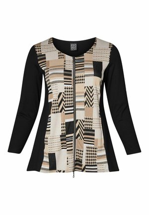 Langarmshirt mit einem Reißverschluss vorne, einem gemusterten beige-schwarzen Einsatz und schwarzen Ärmeln und Rücken. Geometrische Designs überall.