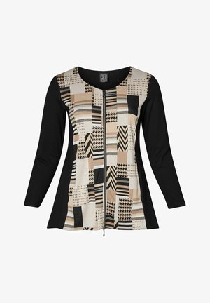 Langarmshirt mit einem Reißverschluss vorne, einem gemusterten beige-schwarzen Einsatz und schwarzen Ärmeln und Rücken. Geometrische Designs überall.