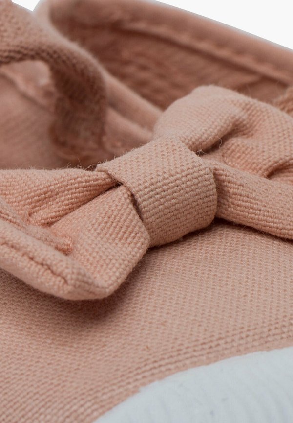 Lauflernschuh – maquillaje