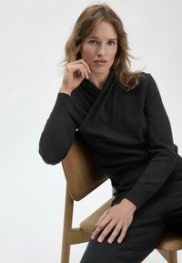 hessnatur WUNDERKIND - Strickpullover - schwarz