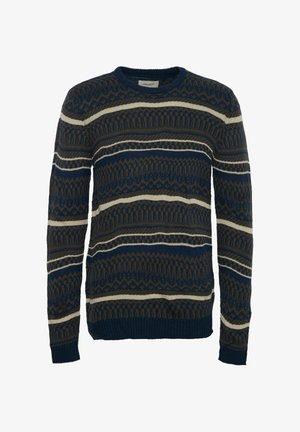 Marineblauwe gebreide trui met geometrische patronen in bruin en crème. Heeft een ronde hals en geribbelde mouwen en rand.