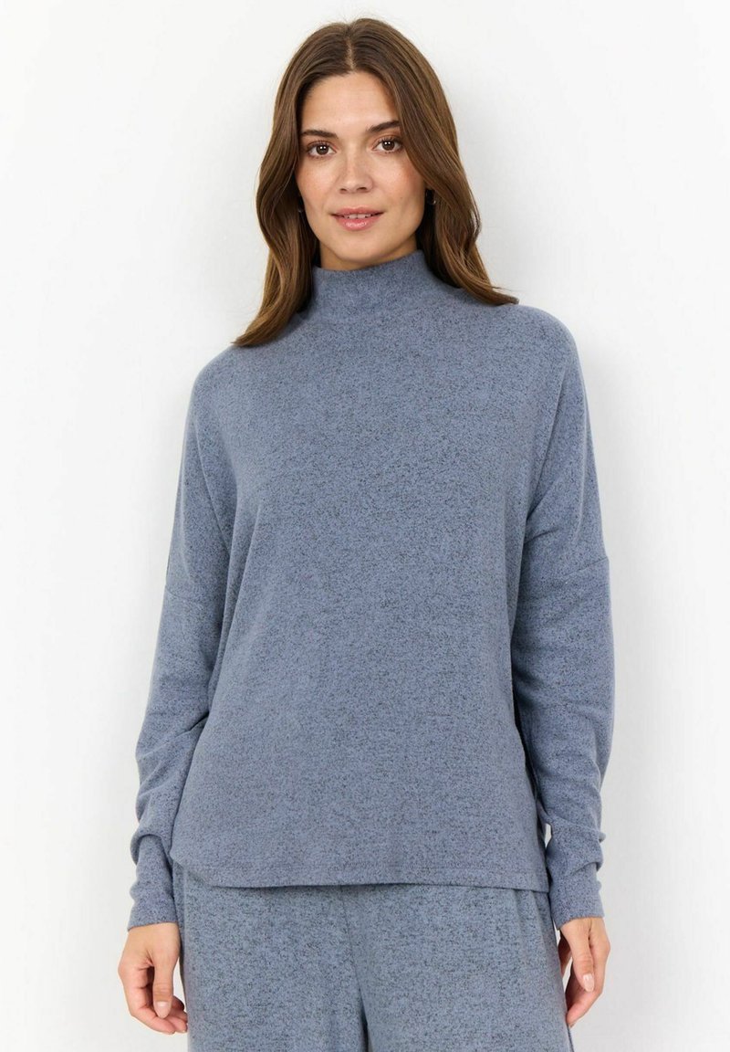 Light blue, long-sleeve mock neck top made of soft fabric with a relaxed fit, featuring a slightly longer back hem and ribbed cuffs.