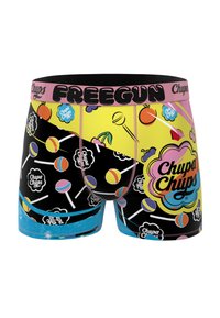 Boxers courts avec un design coloré de bonbons, affichant des sucettes sur un fond noir, rehaussés d'une section jaune et d'une ceinture rose.
