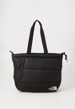 Musta pehmustettu olkalaukku, jossa on kaksi kahvaa, vetoketjullinen yläosa, sivutasku ja valkoinen The North Face -logo alareunan oikeassa reunassa.