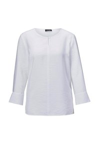 Blusa bianca leggera con maniche a tre quarti, scollo rotondo e chiusura con bottoni frontale. Caratterizzata da una superficie leggermente strutturata.