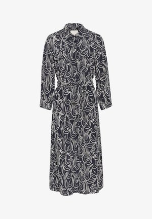 Marineblå kjole med hvidt svudl-mønster, kraveudskæring, lange ærmer og et bælte i taljen. Letvægtigt stof, knælangt design.