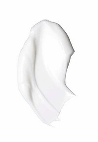 Macchia di crema bianca con una consistenza liscia e lucida, che forma lievi picchi e curve, su uno sfondo neutro.