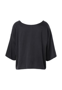 Blouse noire ample avec de larges manches au niveau du coude et un large col rond, vue de dos sur fond blanc.