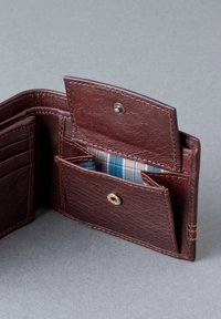 Brown leather wallet with multiple card slots, a patterned inner lining in blue and white, and a snap closure. Textured finish details visible.