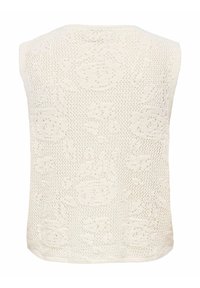 Gilet sans manches en tricot couleur crème avec des motifs floraux et géométriques complexes.